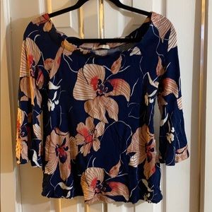 Two off shoulder floral shirts